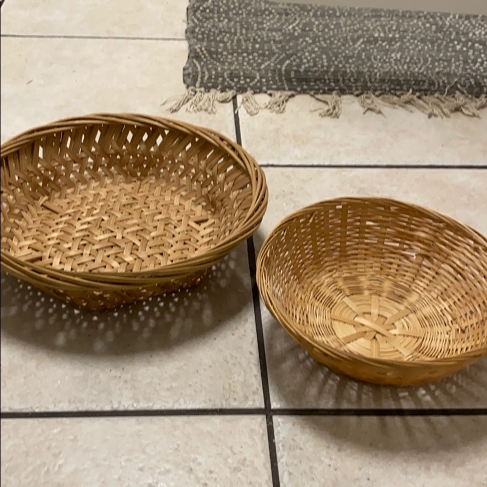Set of two similar woven bowls
